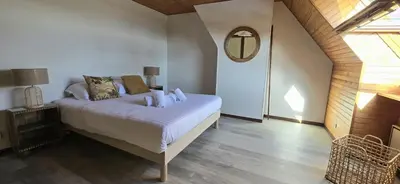 Un ou plusieurs lits dans un hébergement de l'établissement Maison vue mer Crozon - Jacuzzi - Sauna
