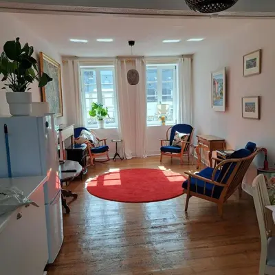 Coin salon dans l'établissement Lumière et Confort en Centre Ville
