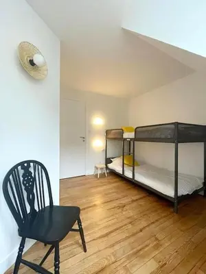 Un ou plusieurs lits dans un hébergement de l'établissement Appartement BZH
