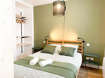 Un ou plusieurs lits dans un hébergement de l'établissement Le petit loft