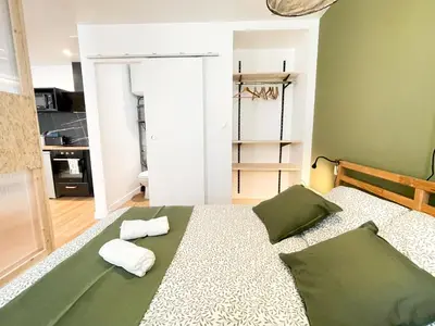 Un ou plusieurs lits dans un hébergement de l'établissement Le petit loft