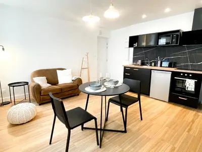 Cuisine ou kitchenette dans l'établissement Le petit loft
