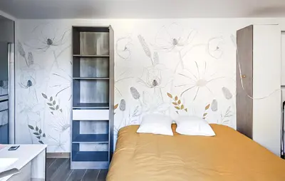 Un ou plusieurs lits dans un hébergement de l'établissement Beautiful Apartment In Saint-Evarzec