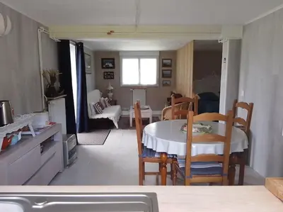 Coin salon dans l'établissement Appartement Pont l'Abbé Entre océan et campagne
