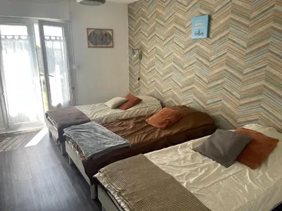 Un ou plusieurs lits dans un hébergement de l'établissement La légende Pontsuval 2eme étage - Centre-ville Brignogan-Plages , 300 m des plages