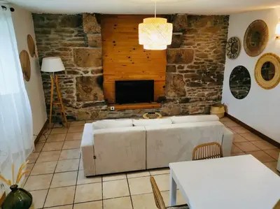 Coin salon dans l'établissement Gîte bohème à 5 min de la plage