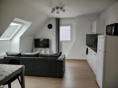 Télévision ou salle de divertissement dans l'établissement appartement