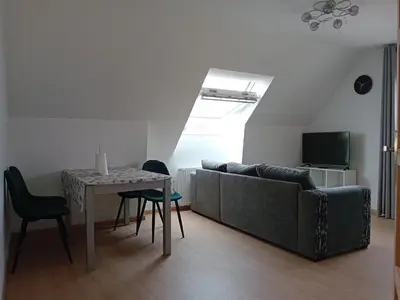 Télévision ou salle de divertissement dans l'établissement appartement