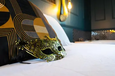 Un ou plusieurs lits dans un hébergement de l'établissement Le Rêve Gatsby