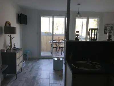 Télévision ou salle de divertissement dans l'établissement Le studio Petit Jean - Roscoff