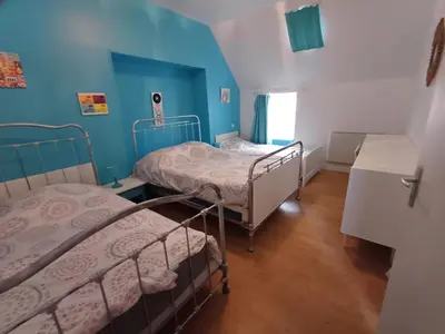 Un ou plusieurs lits dans un hébergement de l'établissement Sublime maison La mouette au coeur du Port du Guilvinec