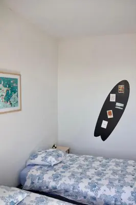 Un ou plusieurs lits dans un hébergement de l'établissement Maison de bord de mer à Plouguerneau