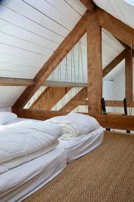 Un ou plusieurs lits dans un hébergement de l'établissement Maison de bord de mer à Plouguerneau