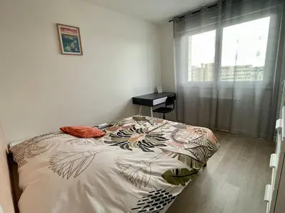 Un ou plusieurs lits dans un hébergement de l'établissement Appartement spacieux Brest Bellevue de 1 à 6 personnes