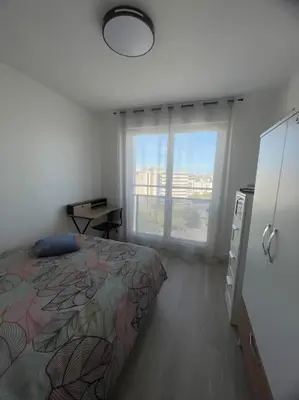 Un ou plusieurs lits dans un hébergement de l'établissement Appartement spacieux Brest Bellevue de 1 à 6 personnes