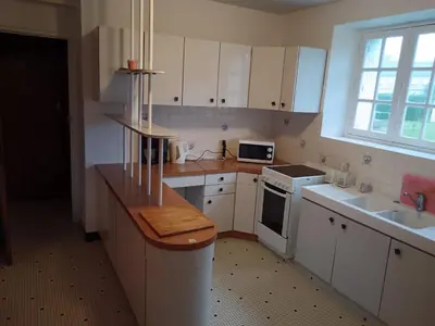 Cuisine ou kitchenette dans l'établissement Ty Coz