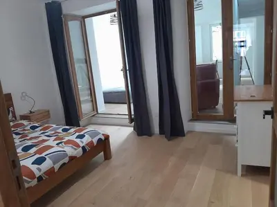 Un ou plusieurs lits dans un hébergement de l'établissement Appartement 75m2 plein centre face a la mairie