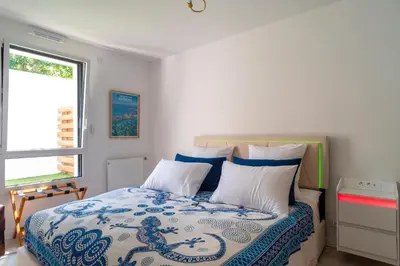 Un ou plusieurs lits dans un hébergement de l'établissement L'Atlantic - Appt à moins 150m de la plage