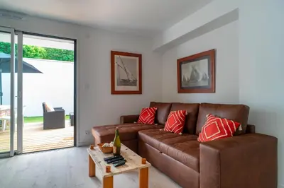 Coin salon dans l'établissement L'Atlantic - Appt à moins 150m de la plage
