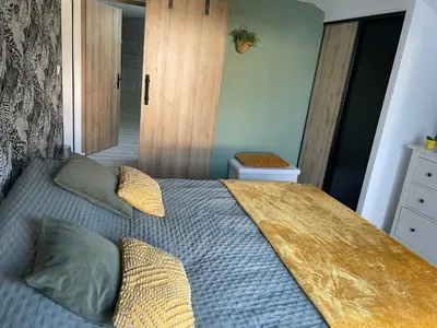 Un ou plusieurs lits dans un hébergement de l'établissement Maison avec piscine 3 chambres