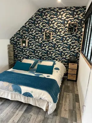 Un ou plusieurs lits dans un hébergement de l'établissement Maison avec piscine 3 chambres