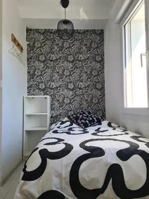Un ou plusieurs lits dans un hébergement de l'établissement Baradozic le petit paradis à Melon