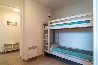 Un ou plusieurs lits dans un hébergement de l'établissement Le Nid de Ker an Aod - Appt à 100m de la plage
