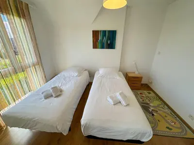 Un ou plusieurs lits dans un hébergement de l'établissement TY BEG - Maison confortable splendide vue mer