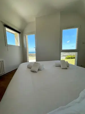 Un ou plusieurs lits dans un hébergement de l'établissement TY BEG - Maison confortable splendide vue mer