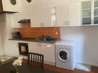 Cuisine ou kitchenette dans l'établissement Le Cocon de Renée, Maison atypique en ville close de Concarneau