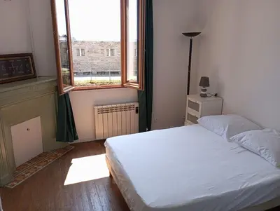 Un ou plusieurs lits dans un hébergement de l'établissement Le Cocon de Renée, Maison atypique en ville close de Concarneau