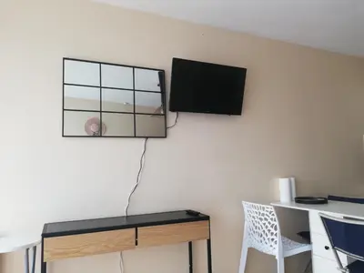 Télévision ou salle de divertissement dans l'établissement Résidence du Trez BENODET