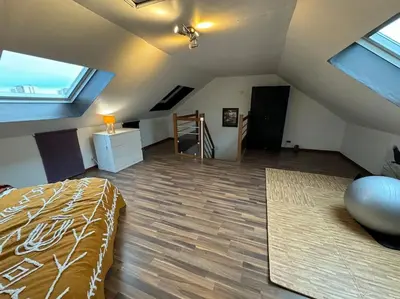 Un ou plusieurs lits dans un hébergement de l'établissement Maison spacieuse spa & jardin