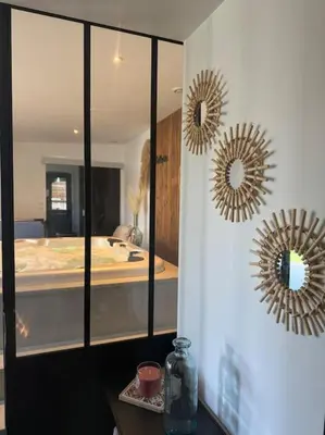 Un ou plusieurs lits dans un hébergement de l'établissement Maison spacieuse spa & jardin