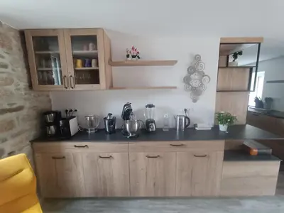 Cuisine ou kitchenette dans l'établissement Le moulin de Kerloroc