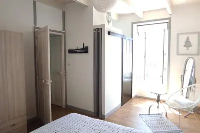 Un ou plusieurs lits dans un hébergement de l'établissement Maison de vacances