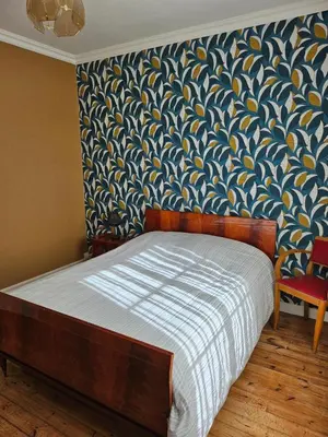 Un ou plusieurs lits dans un hébergement de l'établissement Authentique maison Morlaisienne