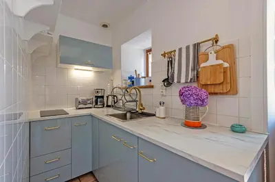 Cuisine ou kitchenette dans l'établissement Kerlizou Plage - Appt à moins d1 km de la plage