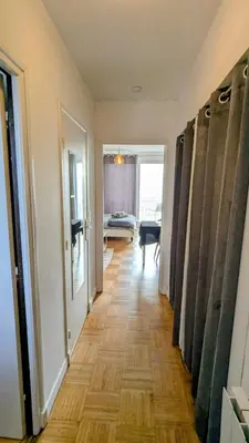 Un ou plusieurs lits dans un hébergement de l'établissement Appartement de charme