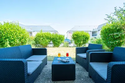 Coin salon dans l'établissement L'Ecume dorée I Centre Ville & terrasse