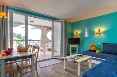 Télévision ou salle de divertissement dans l'établissement Le Tamm Bara - Appt avec piscine partagée