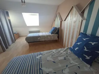 Un ou plusieurs lits dans un hébergement de l'établissement D'une Pointe à l'Autre, Maison avec vue sur mer, à 400 metres de la Plage de Pentrez