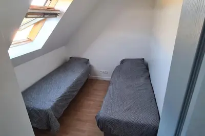 Coin salon dans l'établissement Maison de vacances