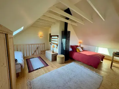 Un ou plusieurs lits dans un hébergement de l'établissement Chalet Cormoran, face à l'océan