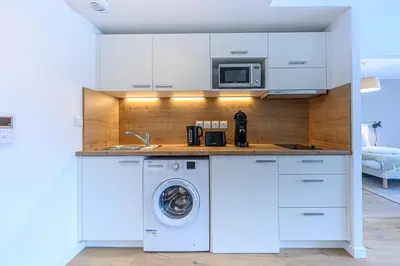 Cuisine ou kitchenette dans l'établissement OVELIA Fouesnant - Les Allées de Kervihan