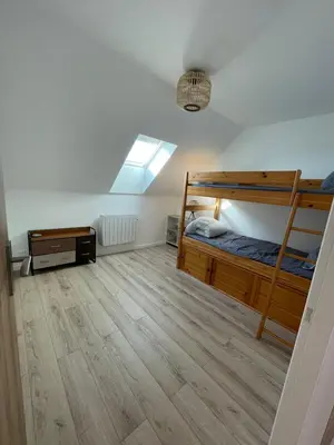 Un ou plusieurs lits dans un hébergement de l'établissement Les Gîtes De Roma
