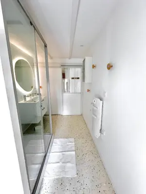 Salle de bains dans l'établissement Au Bon Accueil - Appartement vue mer - Hyper centre - Avec Home-Cinéma