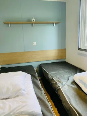 Un ou plusieurs lits dans un hébergement de l'établissement Domaine de Kerlann