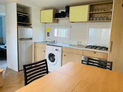 Cuisine ou kitchenette dans l'établissement Domaine de Kerlann