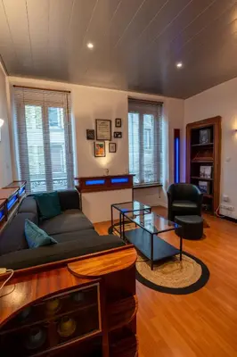 Coin salon dans l'établissement Cocon atypique en rive droite